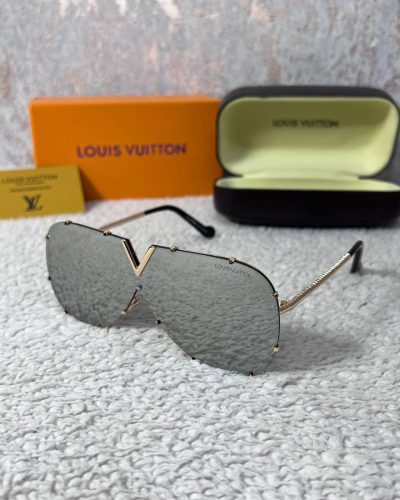 Louis Vuitton Frameless Sunglasses in Grey on Gold