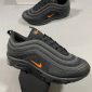 Nike Airmax 97s Sneakers in black color with orange logo
