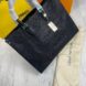Close-up of leather handles and long shoulder straps of the Louis Vuitton On The Go Tote Bag.