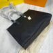 Top open view of Louis Vuitton Empriente Tote Bag showing spacious interior and zipper closure.