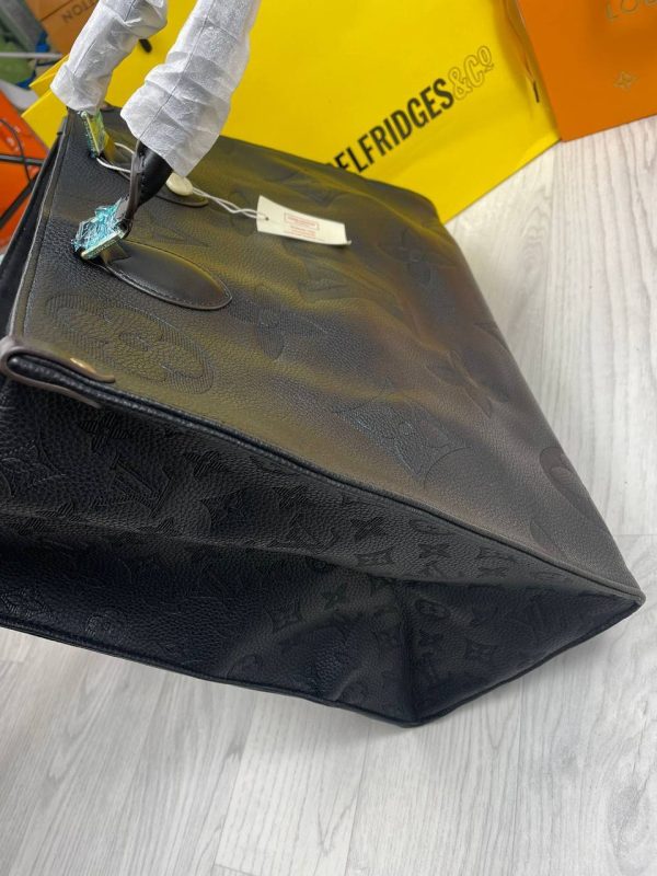 Zoomed-in image of the LV monogram embossed on the Empriente leather. Zoomed-in image of the LV monogram embossed on the Empriente leather.