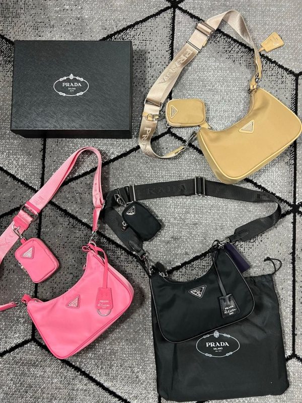 Prada Re-Edition 2005 Multi-Pouch Padded Leather Handbag Crossbody Bag for Women in Black, Begonia Pink & Beige Colour Prada Re-Edition 2005 Multi-Pouch Padded Leather Handbag Crossbody Bag for Women in Black, Begonia Pink & Beige Colour