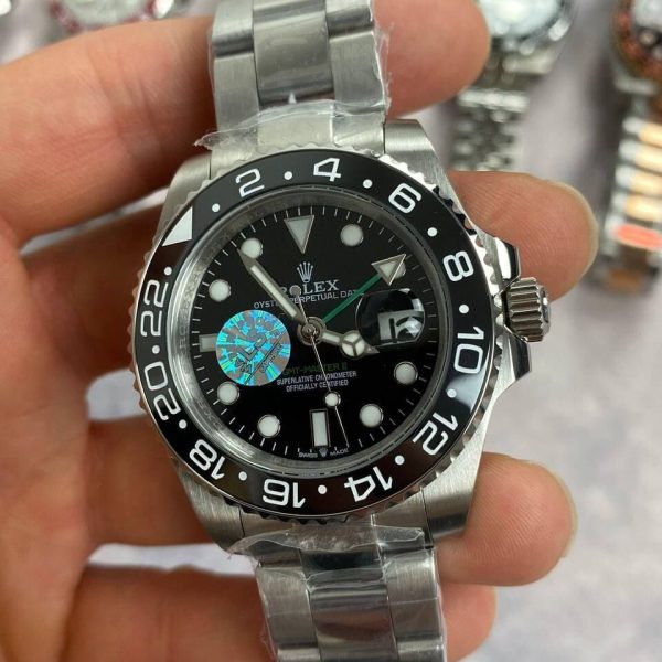 Rolex GMT Master II With Silver Chain Strap and Black Dial