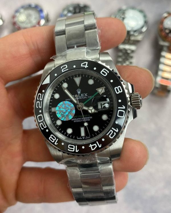 Rolex GMT Master II With Silver Chain Strap and Black Dial