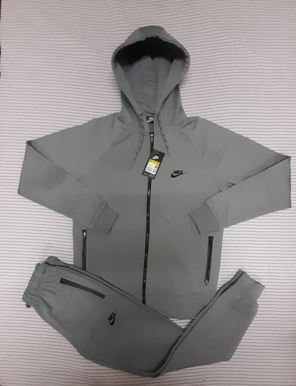 Nike Tracksuit with Zipper Pockets in grey Color Nike Tracksuit with Zipper Pockets in grey Color