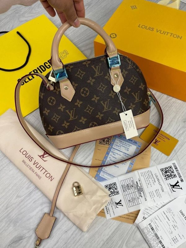 Front View of Louis Vuitton Replica Alma PM Crossbody Bag in Brown Monogram Leather Front View of Louis Vuitton Replica Alma PM Crossbody Bag in Brown Monogram Leather