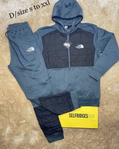 THE NORTH FACE MOUNTAIN ATHLETICS TRACKSUIT in yale blue color