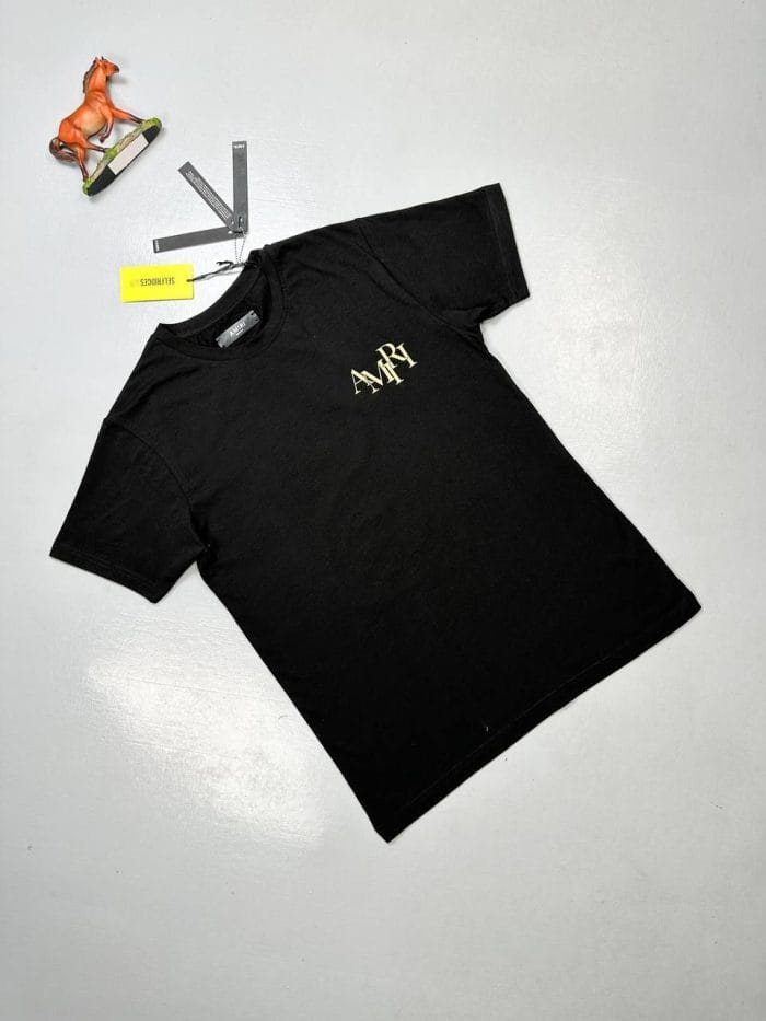 Amiri Black T-Shirt with Gold Logo Print Amiri Black T-Shirt with Gold Logo Print