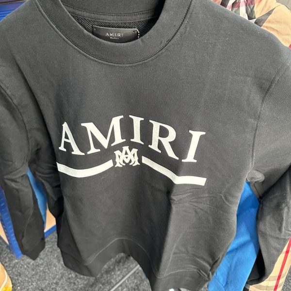 Amiri black cotton jumper with stitched logo patch on chest