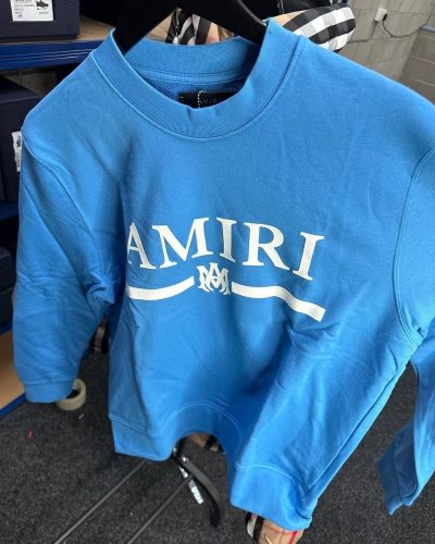 Amiri blue cotton jumper with stitched logo patch on chest