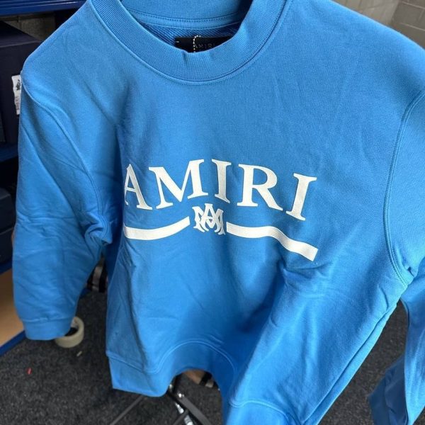 Amiri blue cotton jumper with stitched logo patch on chest