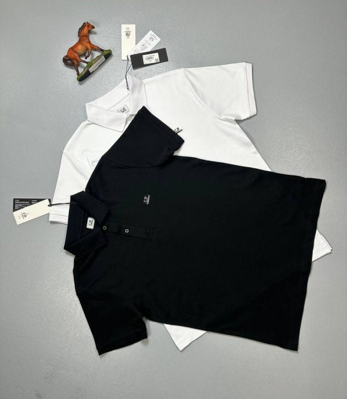 C.P. Company black stretch piquet polo t-shirt front view