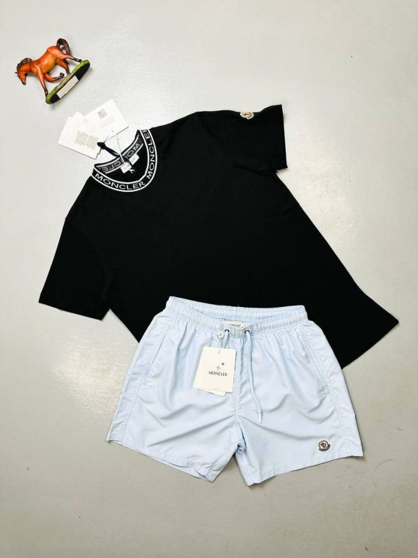 Moncler Crew Neck Collar Logo T-Shirt & Shorts Set black t-shirt with blue shorts Moncler Crew Neck Collar Logo T-Shirt & Shorts Set black t-shirt with blue shorts