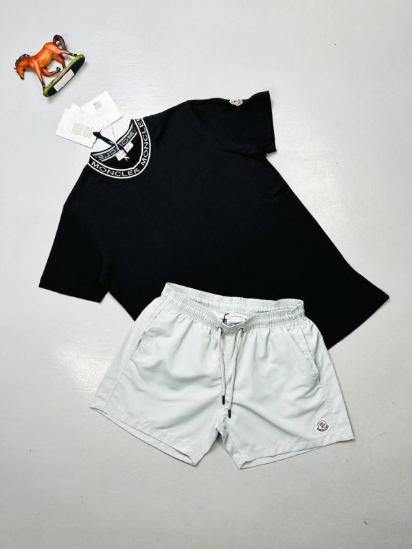 Moncler Crew Neck Collar Logo T-Shirt & Shorts Set black t-shirt with white shorts Moncler Crew Neck Collar Logo T-Shirt & Shorts Set black t-shirt with white shorts