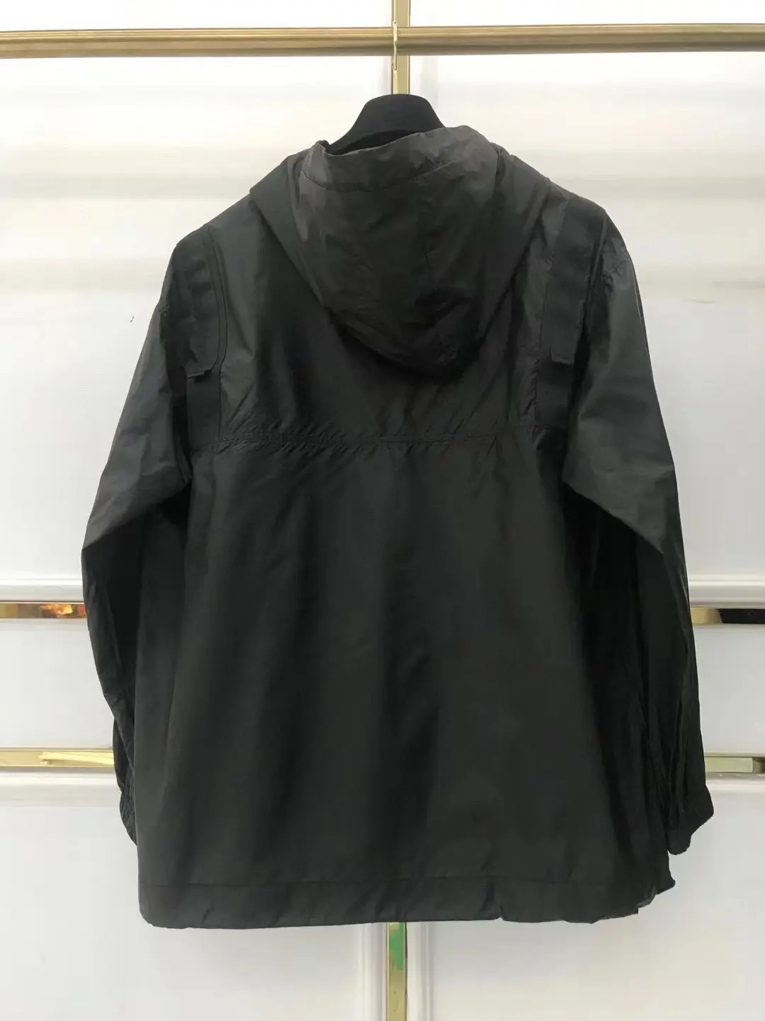 Black Waterproof Hooded Rain Jacket with Zippered Pockets AAA Quailty back