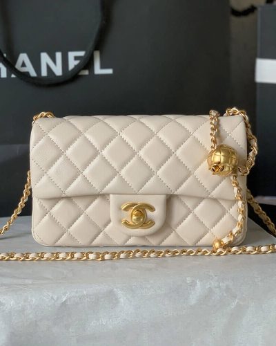 Fake Chanel Pearl Crush mini flap bag in cream white with gold chain front view