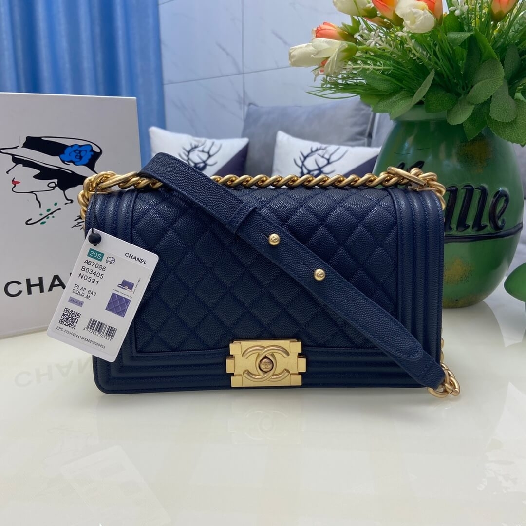 Navy blue Boy Chanel bag with gold brick clasp and chunky chain front view