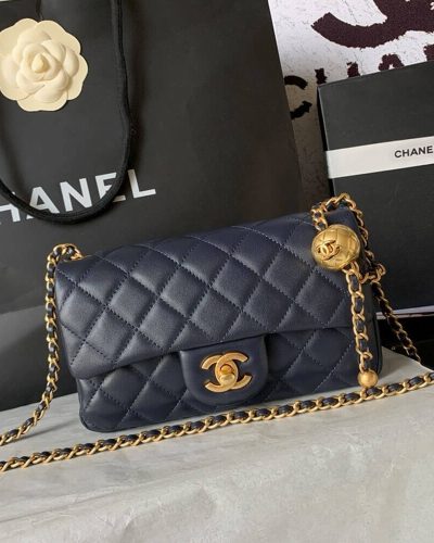 Replica Chanel Pearl Crush mini flap bag in navy blue with gold chain front view