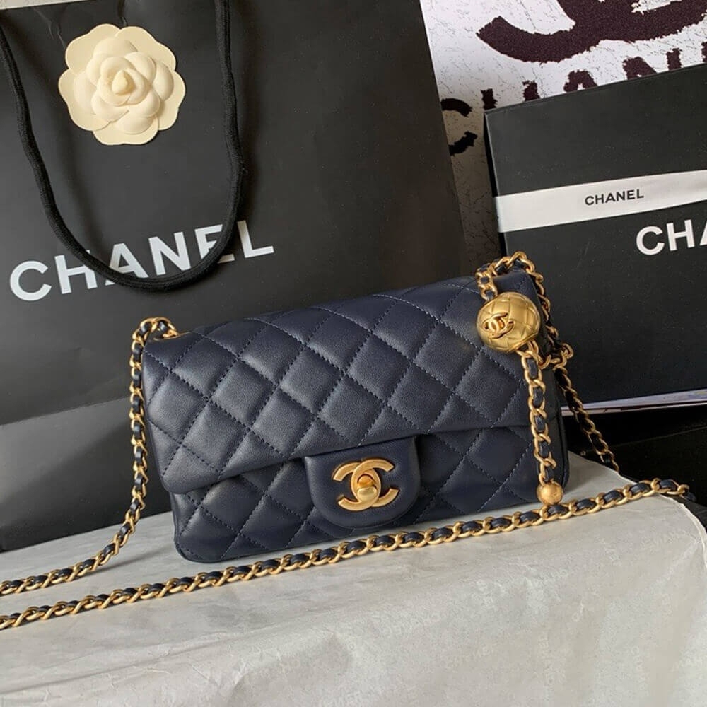 Replica Chanel Pearl Crush mini flap bag in navy blue with gold chain front view